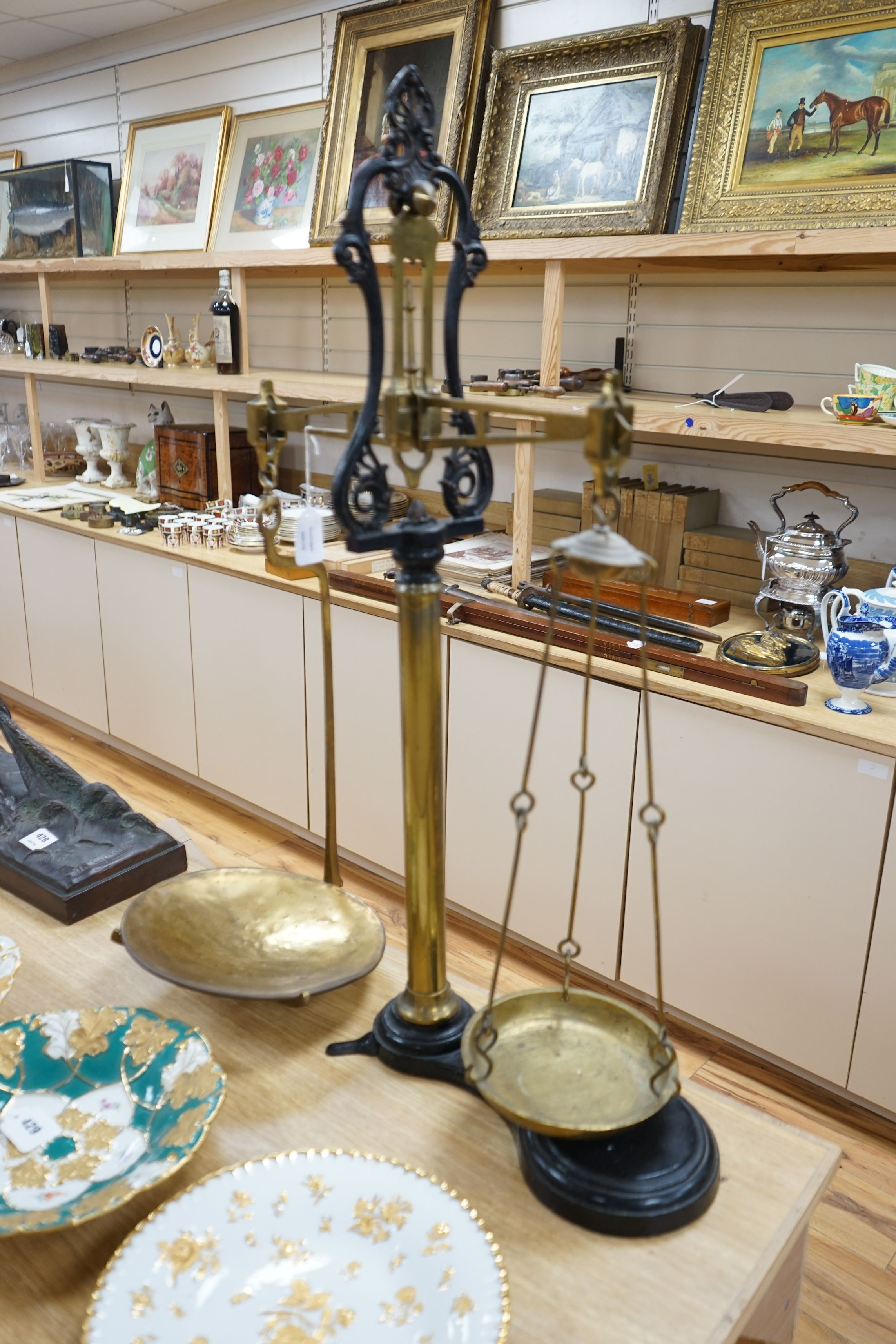 A 19th century set of iron and brass counter scales, 87cms high